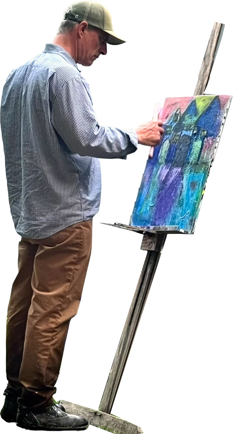 Andrew Buffalino painting at his easel